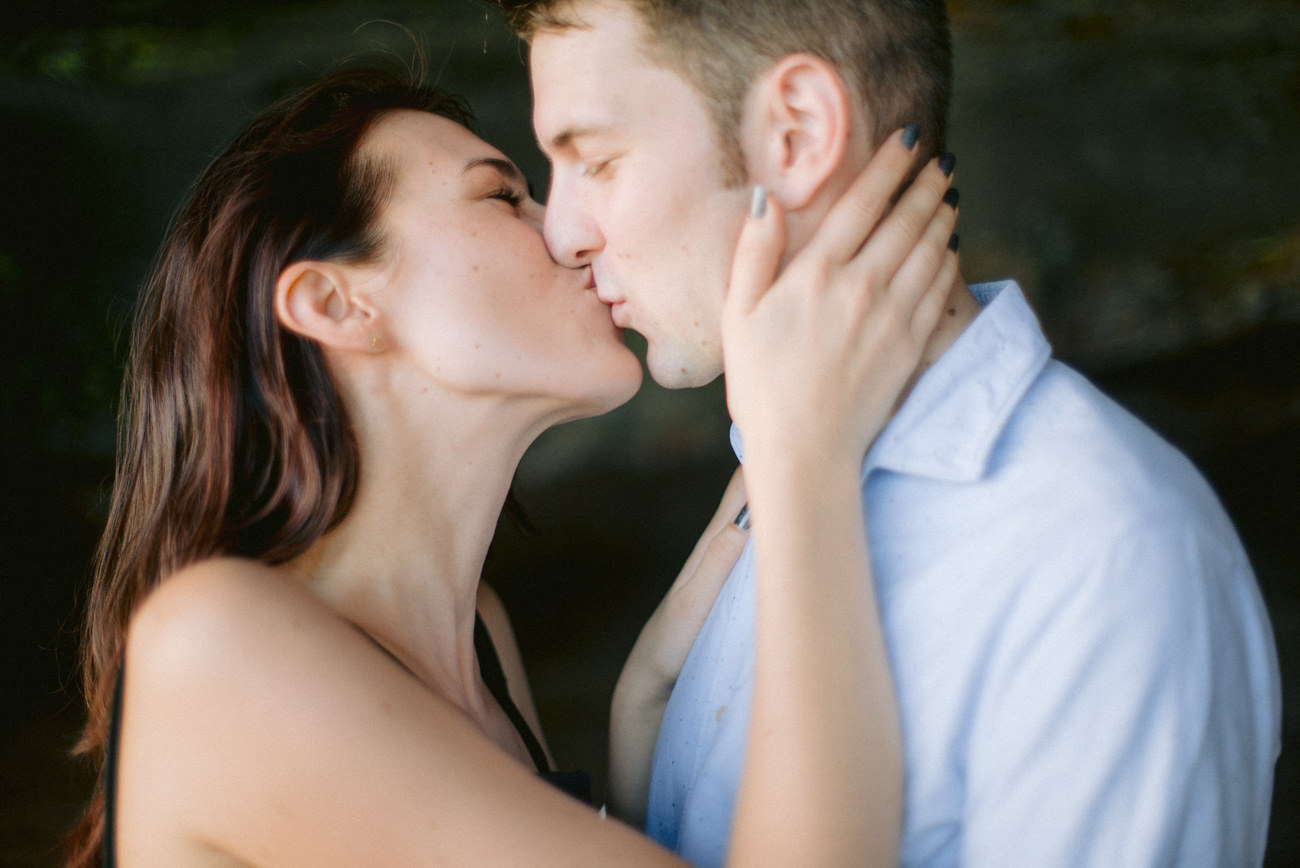 Engagement couple kissing each other