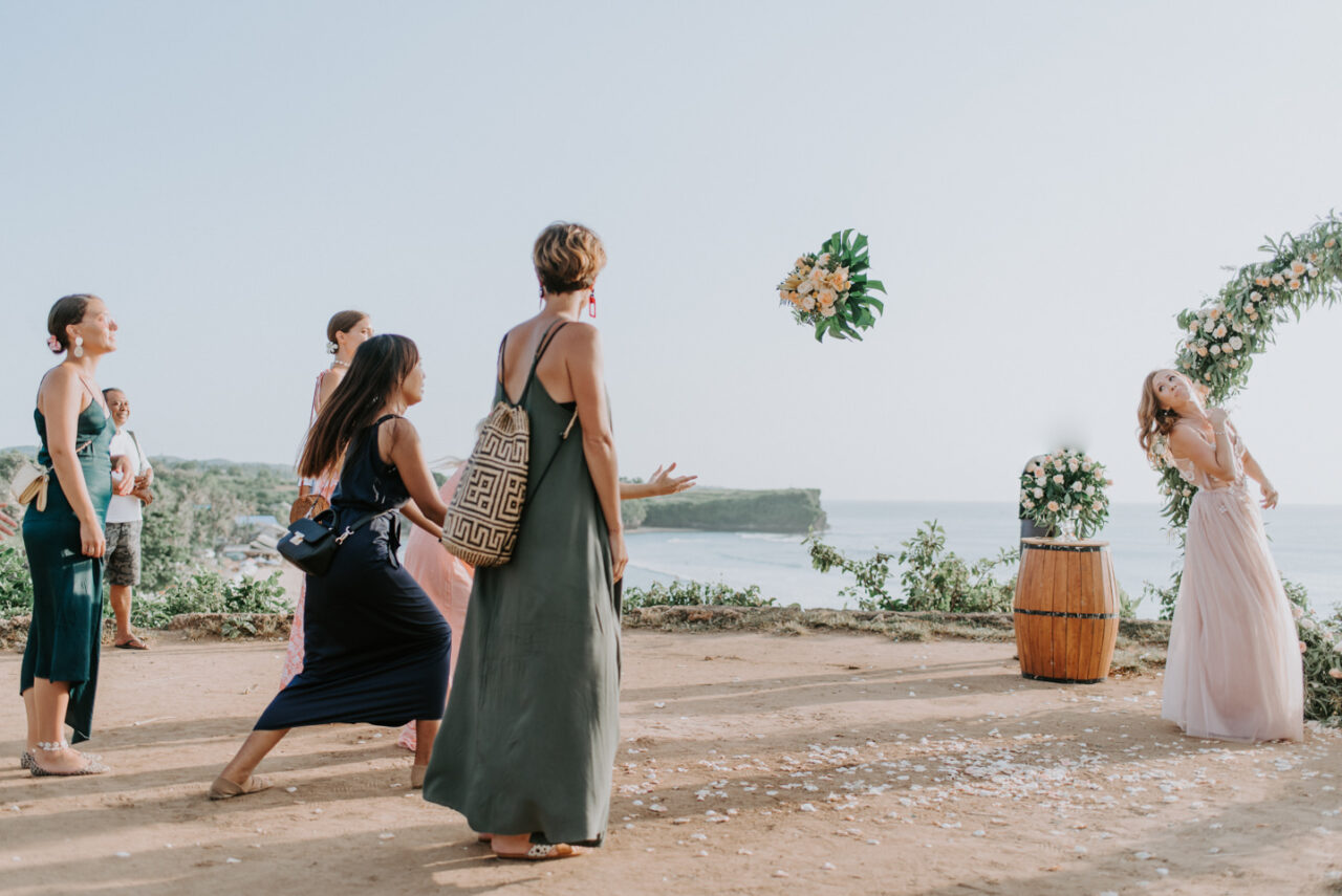 The bride throwing the bouquet