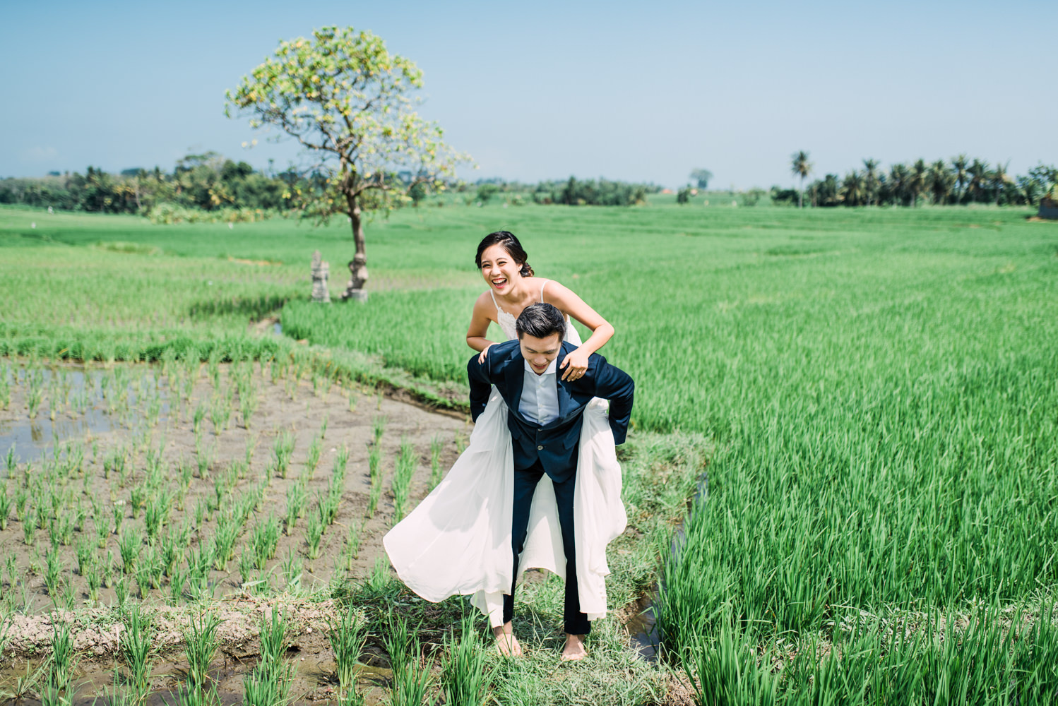 The couple were having fun in Seseh Rice Field during their engagement session